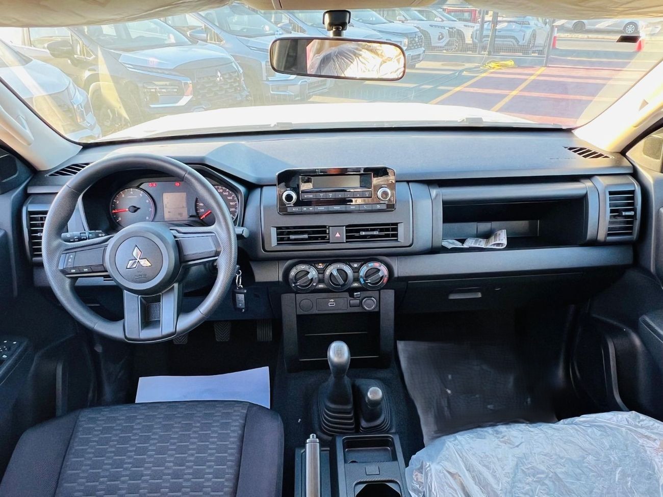 MITSUBISHI L200 PETROL GCC M/T 2026 _ WHITE