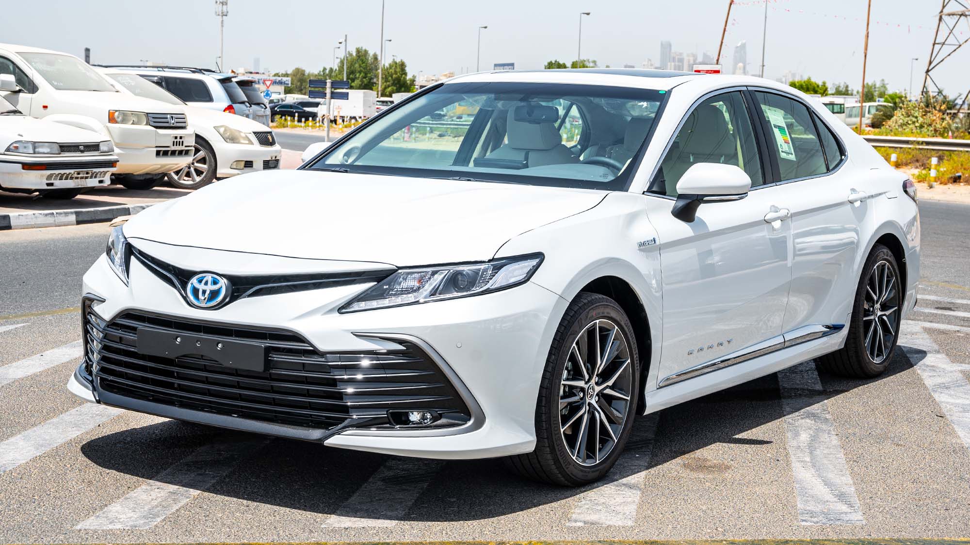 TOYOTA CAMRY GLE 2.5P HEV AT